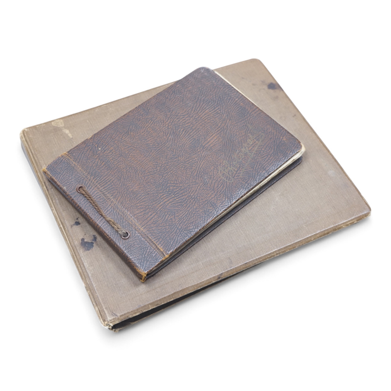 Two WWII naval photo albums, containing an archive of 1940s photographs of the Russian convoy in the Barents Sea, a ship’s concert at Scarpa Flow, a variety of Royal Naval vessels and some aircraft, images aboard HMS Peg